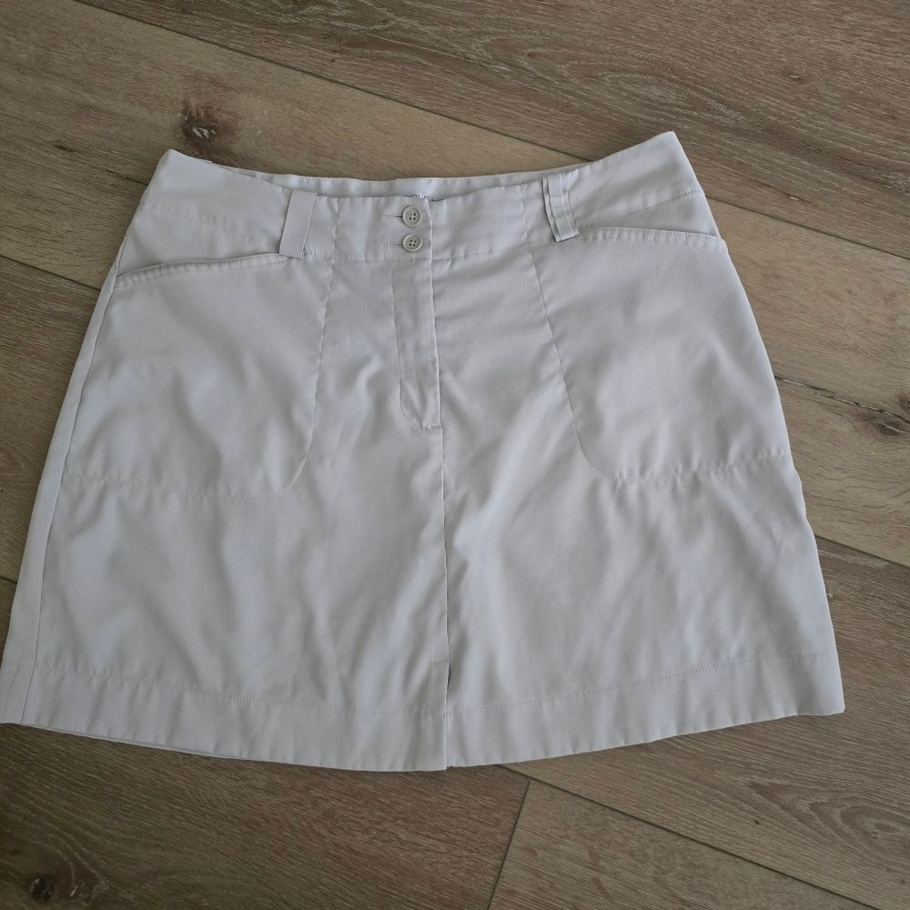 NIKE Dri-fit Ladies GOLF skirt skort Sz 12 tan Pockets Tennis Pickleball